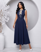 Vestido Midi Evasê Com Laço Frontal E Decote Redondo