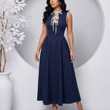 Vestido Midi Evasê Com Laço Frontal E Decote Redondo