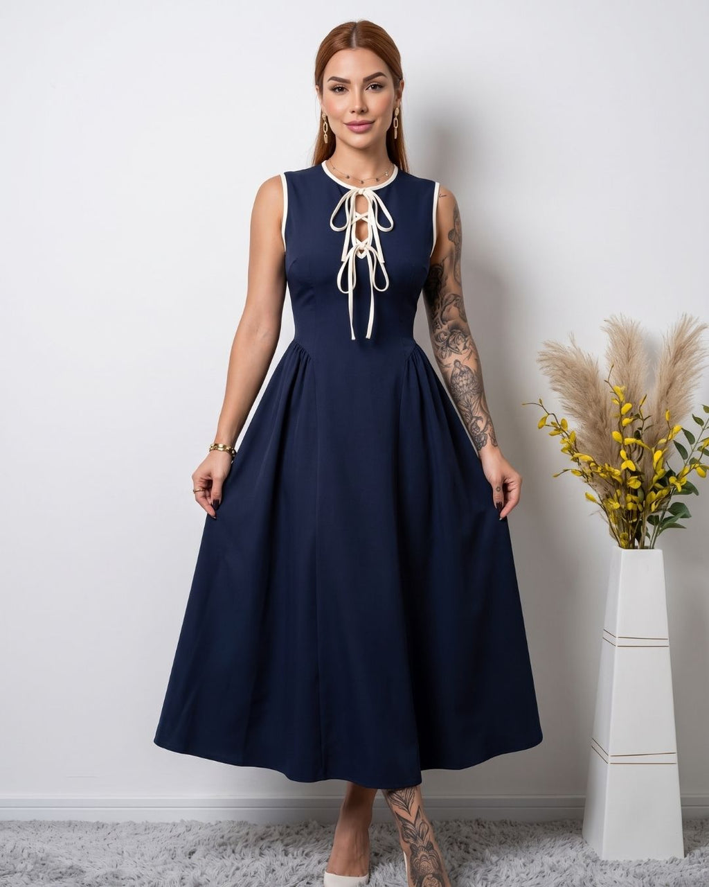 Vestido Midi Evasê Com Laço Frontal E Decote Redondo