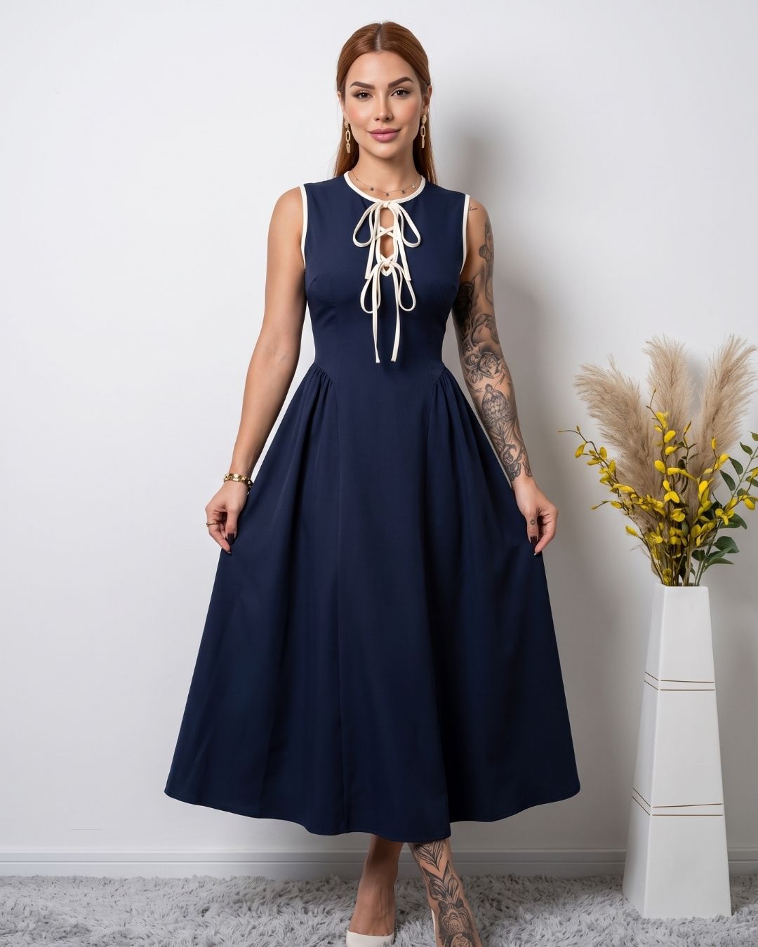 Vestido Midi Evasê Com Laço Frontal E Decote Redondo